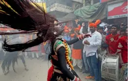  ?? — PTI ?? A man, dressed as Goddess Kali, dances during a religious procession on the occasion of Maha Shivratri festival in Allahabad on Tuesday.