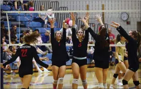  ?? Owen MccUe - MeDiAnewS groUP ?? Boyertown’s Jess Ahart (7) and emily wolfe (19) celebrate a Bears’ point earlier this season.