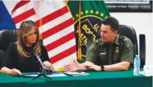  ?? AP FILE PHOTO BY CAROLYN KASTER ?? First lady Melania Trump talks Thursday with Rodolfo Karisch, chief patrol agent, Tucson sector Border Patrol, as she visits a U.S. Customs border and protection facility in Tucson, Ariz.