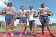  ?? THOMAS BENDER/HERALD-TRIBUNE ?? The Manatee defense has been chiefly responsibl­e for the team's undefeated start. Left to right, Tyreek Robinson, Tez McDowell, Chris Johnson and Ean Johnson-Kelley.