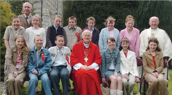  ??  ?? A LOOK BACK IN TIME - Boys and girls of Marshalsto­wn NS pictured with Bishop Eamonn Walsh, David Sheehan (principal) and Fr. Pat Cushen at their confirmati­on in 2005.