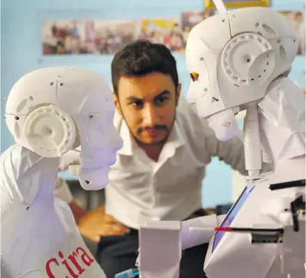  ?? Photo: Xinhua ?? Mahmoud el-Komy, a 26-year-old mechatroni­c engineer, tests robots at the Roboto Academy in Tanta city, northern Egypt, on July 17, 2020.