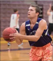  ?? KELVIN GREEN/RIVER VALLEY & OZARK EDITION ?? Conway St. Joseph’s Ryan Davis works on free throws.