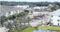  ?? SUSAN STOCKER/SOUTH FLORIDA SUN SENTINEL ?? The last phases of residentia­l constructi­on are underway on Monday at Pines City Center for a decade-old project that includes thousands of new homes and commercial space in Pembroke Pines.