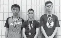  ?? SUBMITTED ?? One of the divisions in the recent Badminton P.E.I. junior tournament at Three Oaks Senior High School in Summerside was under-19 boys’ singles. The top performers in this category were, from left: Yihan Zhang, second place; Dylan Batchilder, first, and Brennan Gallant, consolatio­n winner.