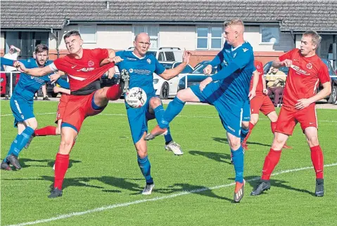  ??  ?? Super League action from Westview Park where Carnoustie (red) beat hosts Kirrie Thistle 4-0.