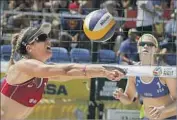  ?? Mark Boster Los Angeles Times ?? APRIL ROSS sets up teammate Kerri Walsh Jennings (not shown) at the Long Beach Grand Slam.