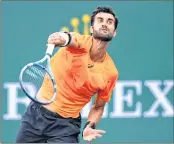  ??  ?? Yuki Bhambri of India serves in his match against Sam Querrey of the United States during the BNP Paribas Open.