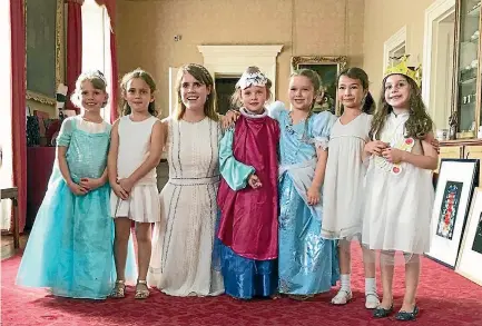  ?? PHOTO: INSTAGRAM ?? Harper Beckham, third from right, and her friends pose for a photo with Princess Eugenie during the private party at Buckingham Palace.