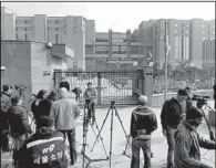  ?? AP/SAURABH DAS ?? Television crews take positions in front of the Saket district court where the accused in a gang rape are being tried Monday, in New Delhi, India.