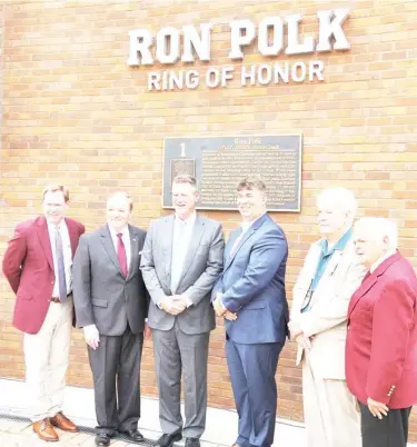  ??  ?? Mississipp­i State Athletic Director John Cohen, left, President Mark Keenum, second from left, and former head baseball coach Ron Polk, right, stand with Bobby Thigpen, remaining from left, Eric Dubose and Beau Gregory, the son of the late former coach and student-athlete Paul Gregory. Thigpen, Dubose and Paul Gregory are the 2020 inductees into the Ron Polk Ring of Honor. Another ceremony will be held in May to recognize the 2021 class. (Photo by Craig Jackson, for Starkville Daily News)