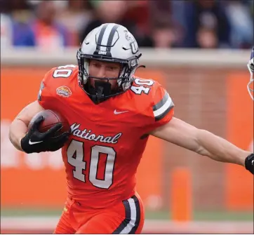 ?? ASSOCIATED PRESS FILE PHOTO ?? National running back Dylan Laube of New Hampshire carries the ball during the second half of the Senior Bowl NCAA college football game on Feb. 3 in Mobile, Ala.