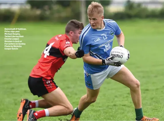  ??  ?? Donnchadh O’Sullivan, Firies slips past Michael Heaphy, Tarbert during their County League Division 4 clash at Farranfore on Sunday Photo by Michelle Cooper Galvin