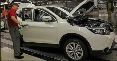  ??  ?? Model of efficiency: A Nissan Qashqai on the assembly line at the company’s Sunderland plant