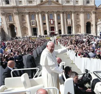  ?? Photo: Alessandro Bianchi/Reuters ?? Pope Francis waves as he leaves after a Holy Mass to mark the feast of Divine Mercy at the Vatican yesterday. He is due to visit Ireland in August.