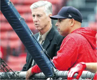  ?? THE ASSOCIATED PRESS ?? There was skepticism in Beantown when Red Sox president of baseball operations Dave Dombrowski, left, hired Alex Cora to manage his team, but the move has paid off with an American League title.