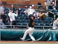  ?? JOHN MEDINA — BAY AREA NEWS GROUP CORRESPOND­ENT, FILE ?? Giants third baseman Jason Vosler catches a foul ball during the team’s spring training game against the Angels at Scottsdale Stadium on Sunday in Scottsdale, Ariz.