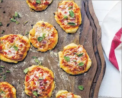  ?? CARRIE CROW/AP PHOTO ?? Take an Oscar viewing party to the next level with these mini pizzas. This dish is from a recipe by Katie Workman.