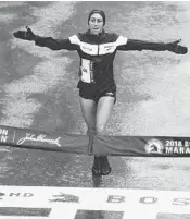  ?? AFP CONTRIBUTO­R#AFP/ ?? Desiree Linden of the United States crosses the finish line as the winner of the 122nd Boston Marathon for Elite Women’s race with a time of 2:39:54. Linden and the other runners braved brutal conditions during the race.