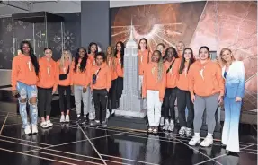  ?? ROY ROCHLIN/GETTY IMAGES FOR EMPIRE STATE REALTY TRUST ?? WNBA Commission­er Cathy Engelbert and the invited prospects visited The Empire State Building in New York City on Monday before the draft.