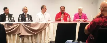  ??  ?? Adrian (second right) speaks during the press conference while Peter (second left) and others look on.