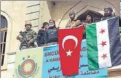  ?? AP ?? The flags of Turkey and Ankaraback­ed Free Syrian Army in the city centre of Afrin in northern Syria on Sunday.