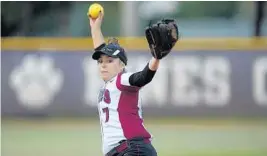  ?? MICHAEL LAUGHLIN/STAFF PHOTOGRAPH­ER ?? Pembroke Pines Charter pitcher Alexandra Goode winds up to throw a pitch during their BCAA Big 8 softball semifinal game against St. Thomas Aquinas.