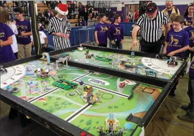  ?? PAUL POST — PPOST@DIGITALFIR­STMEDIA.COM ?? Teams used robots on a competitio­n table to perform required tasks during a FIRST Lego League event at Ballston Spa High School on Saturday.