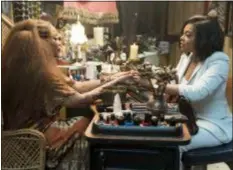  ?? JESS MIGLIO — PARAMOUNT PICTURES VIA AP ?? This image released by Paramount Pictures shows Erykah Badu, left, and Taraji P. Henson in a scene from “What Men Want.”