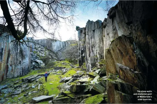  ?? ?? The steep walls and shattered spoil of Wetherlam’s slate quarries.