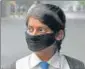  ?? DHEERAJ DHAWAN/HT ?? ■ A school girl wearing mask to protect herself from air pollution in Lucknow.