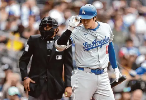  ?? Sean M. Haffey/Getty Images ?? Not having to worry about pitching this season as his arm heals, Shohei Ohtani is thriving as a hitter and even as a base stealer.