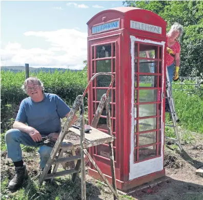  ?? Picture: Angus Whitson. ?? The old telephone box at Heughhead being restored by Phil and Gill Cook.