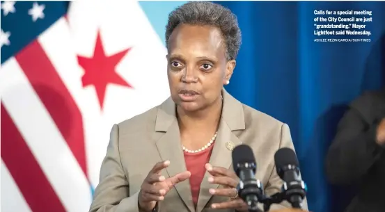  ?? ASHLEE REZIN GARCIA/SUN-TIMES ?? Calls for a special meeting of the City Council are just “grandstand­ing,” Mayor Lightfoot said Wednesday.