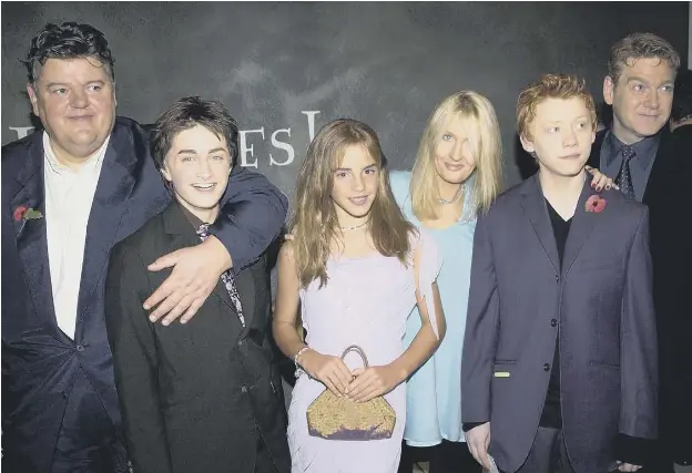  ??  ?? 0 The cast of Harry Potter And The Chamber Of Secrets and author JK Rowling at the film’s premier. Robbie Coltrane, left, defended the author’s views on gender identity