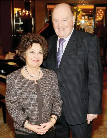  ??  ?? George Hook, pictured here with wife Ingrid, apologised for the comments. Photo: Kieran Harnett