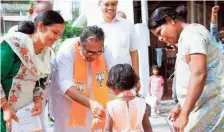  ?? SPECIAL ARRANGEMEN­T. ?? (Clockwise from top left) LDF candidate K.J. Shine, UDF candidate Hibi Eden, and NDA candidate K.S. Radhakrish­nan during their election campaign in the Ernakulam Lok Sabha constituen­cy.