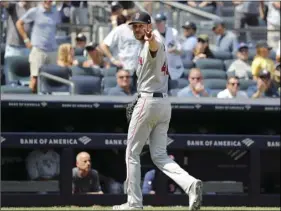  ??  ?? Boston Red Sox Chris Sale reacts to the umpires after being subbed out against the New York Yankees in the fourth inning of a baseball game, on Saturday, in New York. AP PHOTO/MICHAEL OWENS