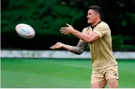  ?? AFP ?? New Zealand Sevens player Sonny Bill Williams passes the ball during a training session on Tuesday. —