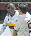  ??  ?? Devante Cole celebrates his winner for Motherwell.