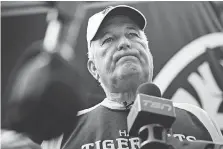  ?? AARON LYNETT/THE CANADIAN PRESS ?? Hamilton Tiger-Cats head coach June Jones speaks to reporters after a practice in Hamilton on Tuesday. Jones called the team’s hiring and firing of Art Briles “an emotional thing.”