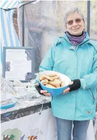  ??  ?? Stall-holder Debbie Poole from the Verstile Vegetable with her vegetarian ‘sausage’ rolls