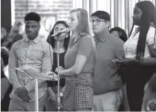  ??  ?? Baylor School senior Genna Ringler presents for her group during Wednesday's event. The Mayor's Youth Council is made up of 39 high school students from 16 schools across Chattanoog­a.