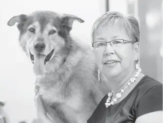  ?? RICHARD MARJAN/POSTMEDIA NEWS ?? Senator Lillian Dyck and her dog Teddy at her home in Saskatoon. ‘He’s a mishmash, kind of like me,’ she says.