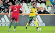  ?? Picture: PRESS FOCUS/GETTY IMAGES ?? SHOWING PROMISE: SA’s Promise Mkhuma, seen here fending off Ruben Vinagre of Portugal in a Fifa Under-20 World Cup game last year, is living up to his name