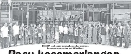  ??  ?? PESERTA rombongan lawatan bergambar kenangan bersama guru-guru dan staf SK Seri Pagi.