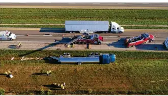  ?? JAROD THRUSH / STAFF ?? A semi hauling milk crashed on Interstate 70 East near Ohio 49 in Clayton on Thursday. There are no plans to expand I-70 to three lanes along this stretch.
