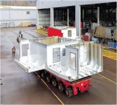  ??  ?? A block of the second Canadian Coast Guard vessel being moved by a self-propelled modular transporte­r.