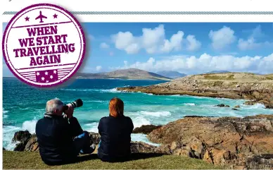  ??  ?? Quiet interlude: A couple enjoy the view at Geodha Mhartainn on the Isle of Harris