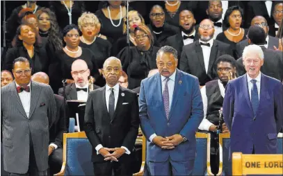  ?? Paul Sancya ?? The Associated Press Louis Farrakhan, from left, Rev. Al Sharpton, Rev. Jesse Jackson and former President Bill Clinton attend the funeral service for Aretha Franklin on Friday at Greater Grace Temple in Detroit.